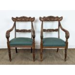 ARMCHAIRS, a pair, mid 19th century mahogany with green stuffover seats, 91cm H x 58cm x 58cm. (2)