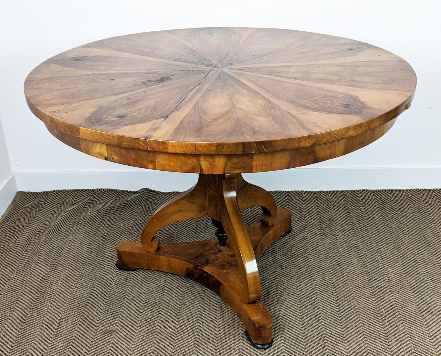 CENTRE TABLE, Biedermeier walnut, ebonised and inlaid with circular segment veneered top, 82cm H x