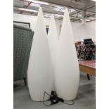 SKYLINE FLOOR LIGHTS, a set of three opaque resin cones, each 122cm tall.