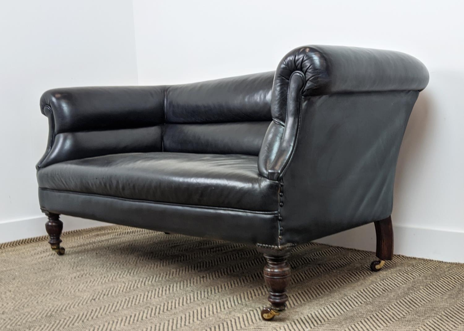 CHESTERFIELD SOFA, Victorian mahogany in black leather on ceramic castors, 76cm H x 157cm x 82cm. - Bild 8 aus 16