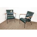 ARMCHAIRS, a pair, green leather upholstery with wooden arms and metal supports, 65cm x 75cm H x