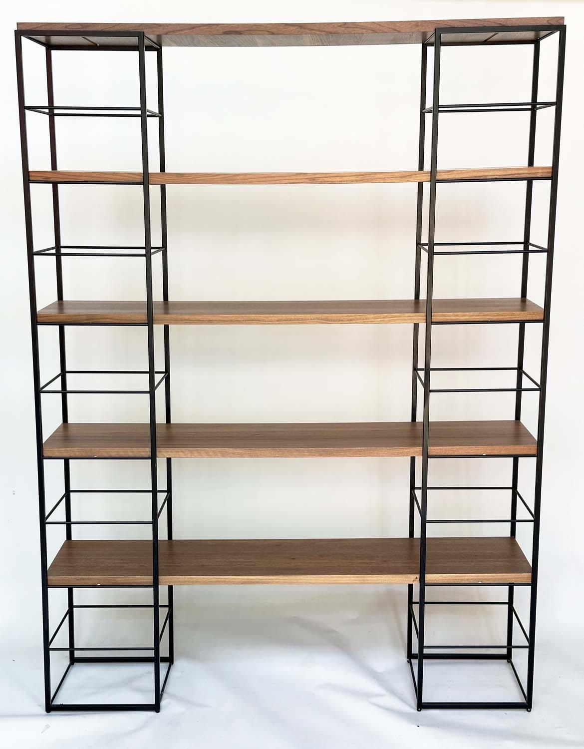 SHELVING RACK BY 'HEALS', comprising two metal towers with five walnut shelves, 150cm W x 32cm D x