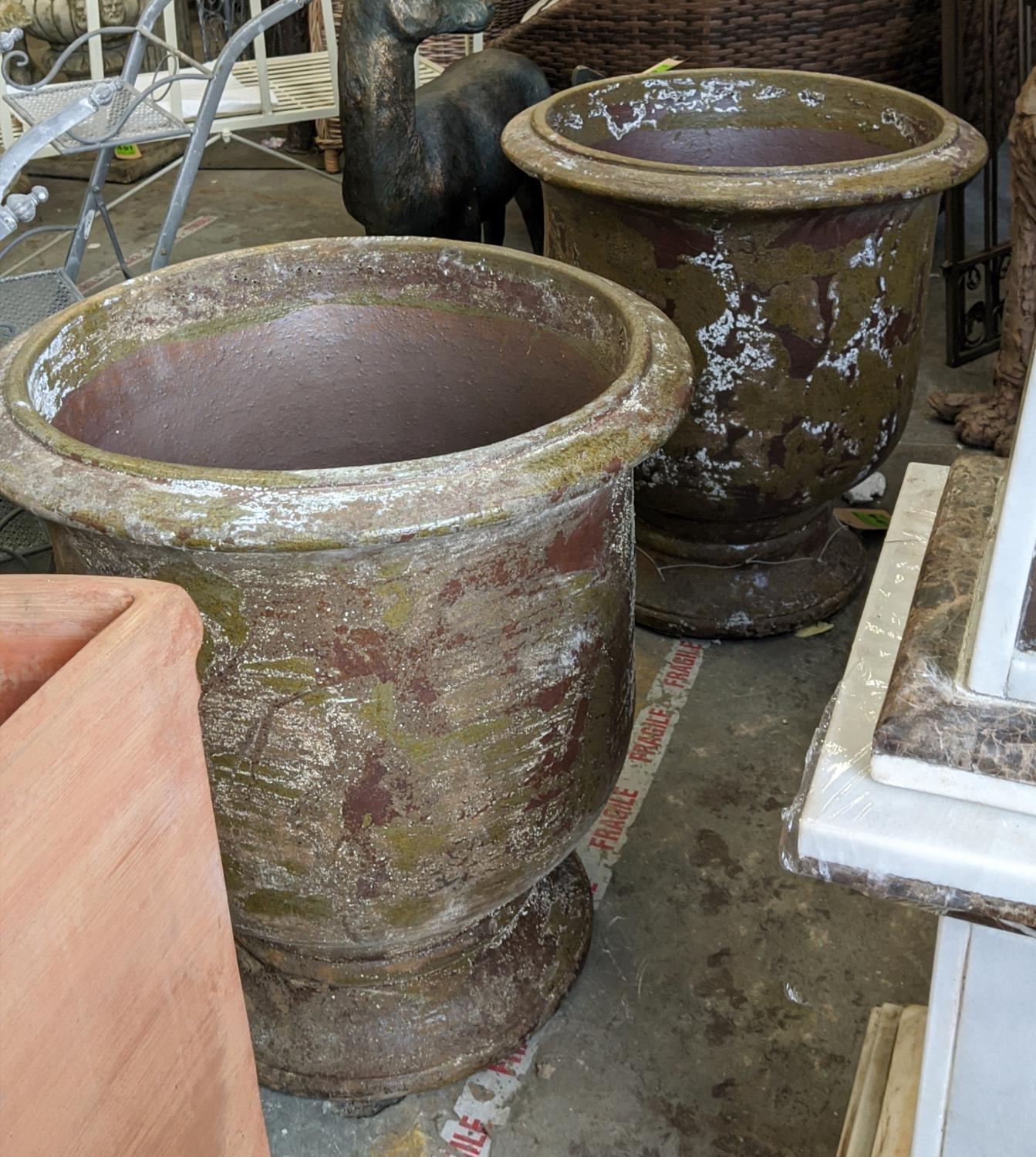 FIRED CLAY PLANTERS, a pair, 67cm H x 60cm W. (2)