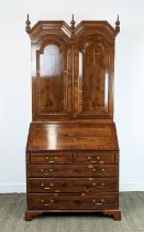BUREAU CABINET, George II style yewwood and stellar inlaid with three finials over panelled doors