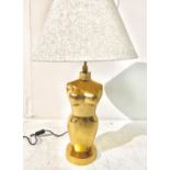 TABLE LAMP, gilt metal nude female form with shade, 80cm H x 50cm W.