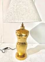 TABLE LAMP, gilt metal nude female form with shade, 80cm H x 50cm W.