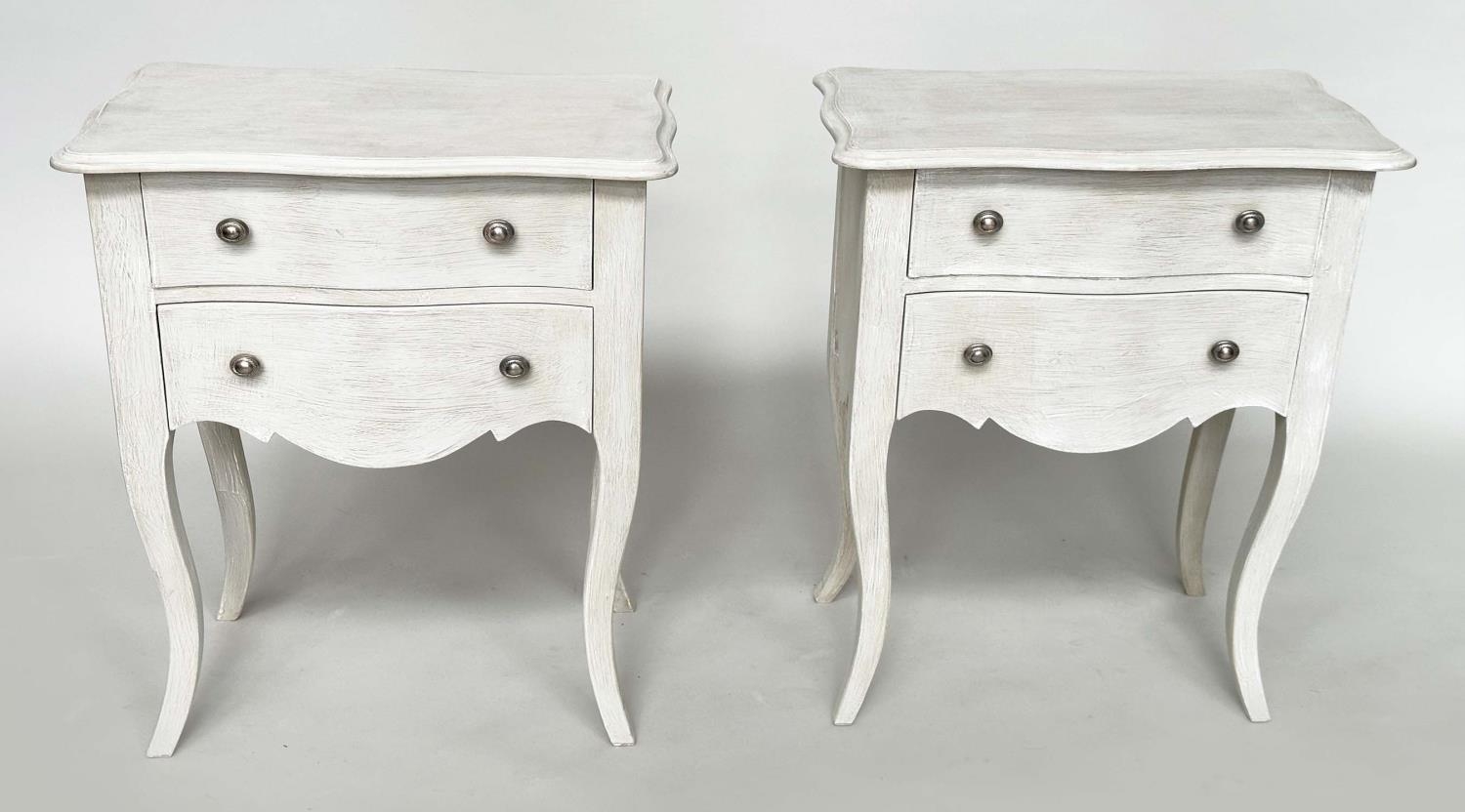 BEDSIDE CHESTS, a pair, French traditionally grey painted each with two drawers and cabriole