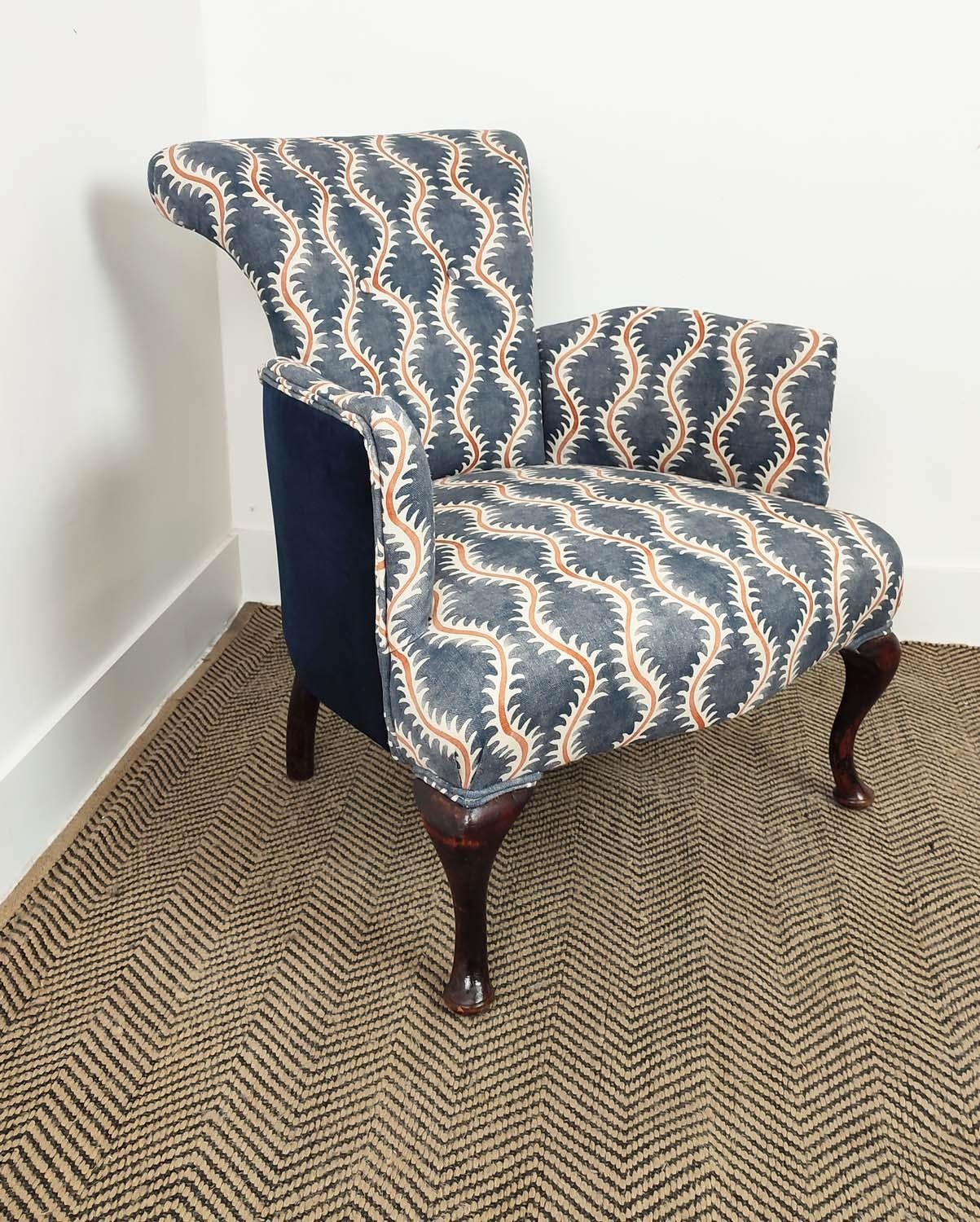 ARMCHAIR, Edwardian upholstered in patterned fabric and navy blue velvet, 74cm H x 62cm.