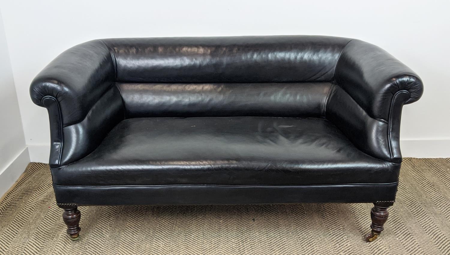 CHESTERFIELD SOFA, Victorian mahogany in black leather on ceramic castors, 76cm H x 157cm x 82cm. - Bild 2 aus 16
