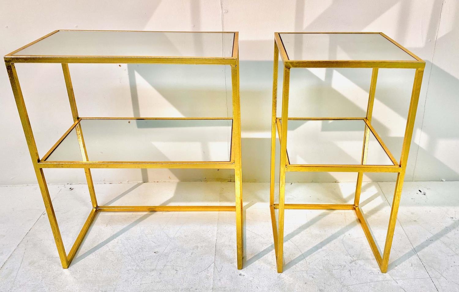 SIDE TABLES, a set of two, of two-tier form, both gilt metal and mirrored glass, largest 60cm H x