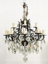 CHANDELIER, patinated metal with clear and amber glass drops from fifteen lights, 60cm W x 114cm