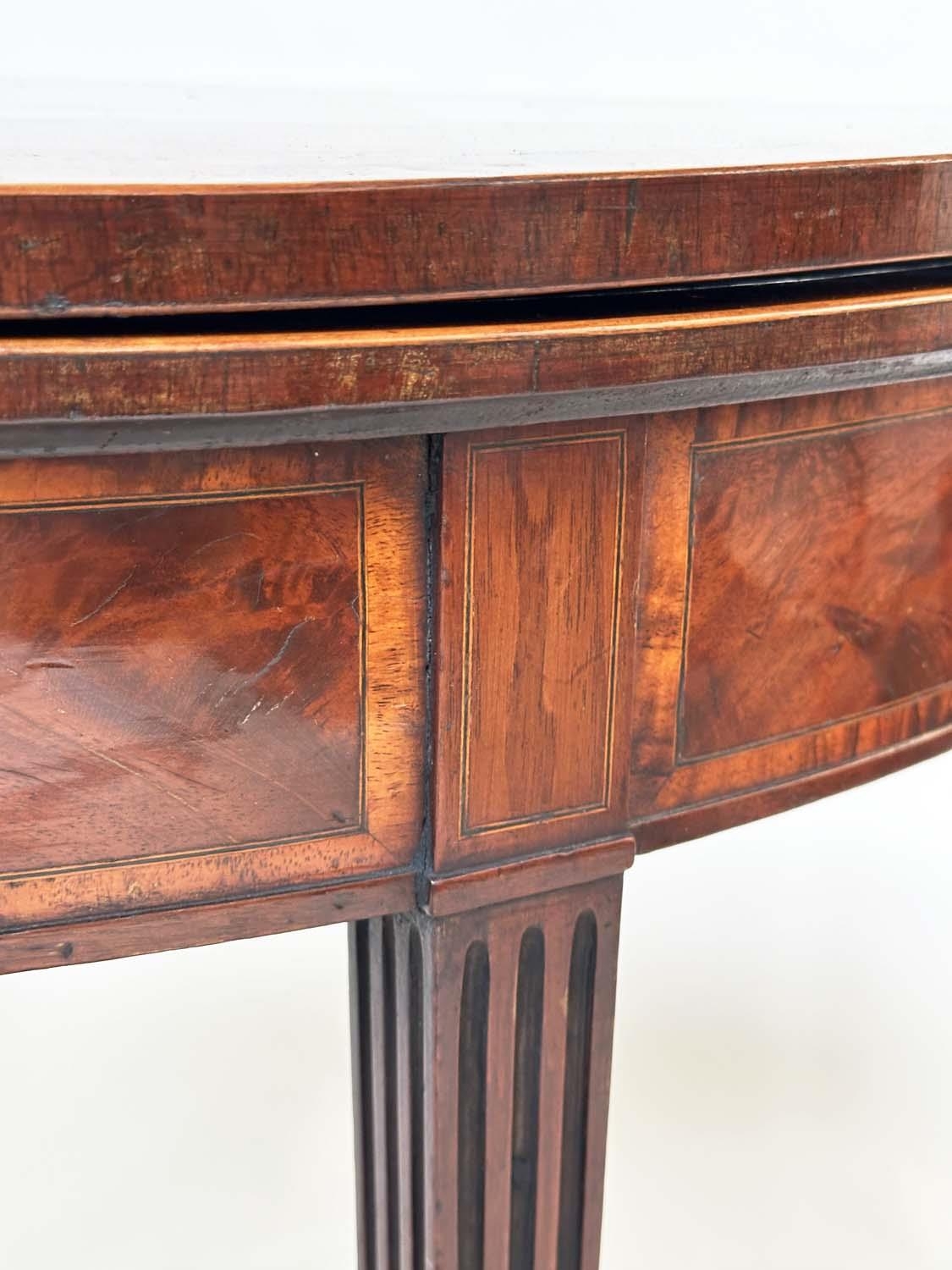 TEA TABLE, George III period flame mahogany and tulipwood crossbanded demilune foldover with - Image 2 of 8