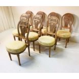 DINING CHAIRS, a set of eight, Louis XVI style balloon backed in beechwood with upholstered seats,
