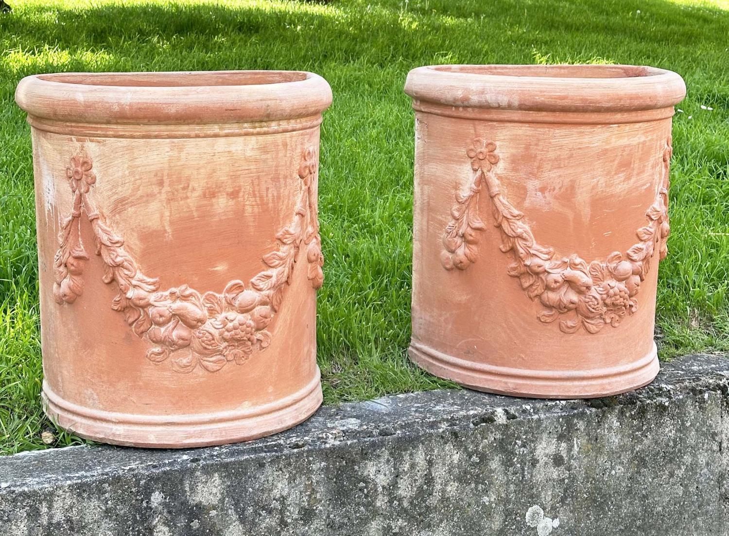 GARDEN PLANTERS, a pair, weathered Tuscan terracotta, D-section with swag decoration, (marks