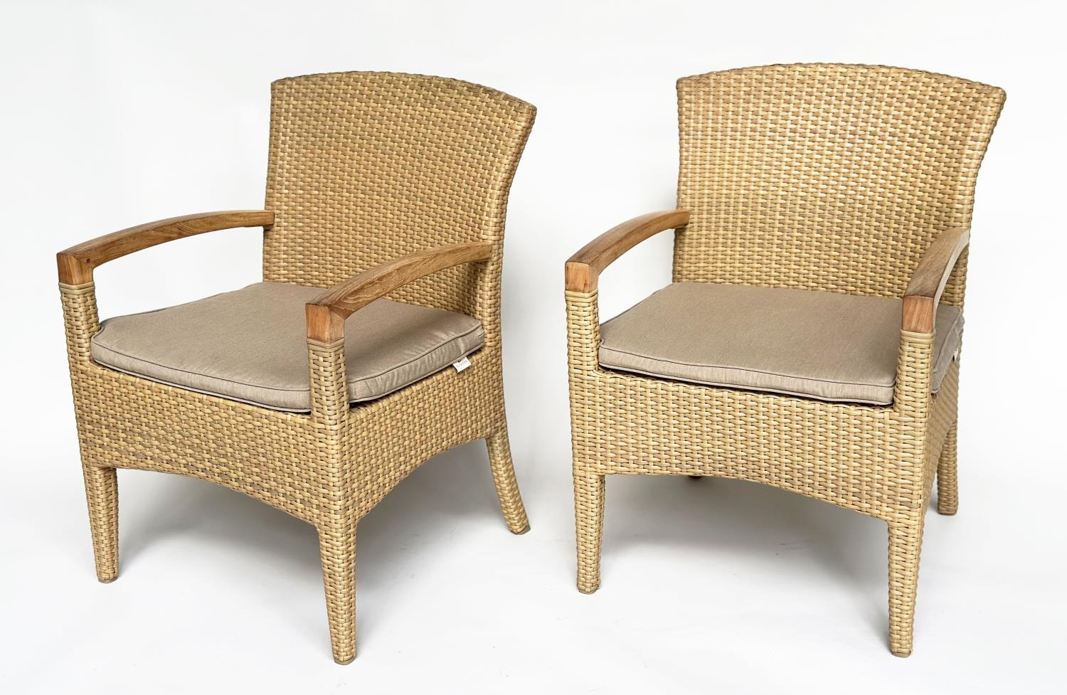 TERRACE/GARDEN ARMCHAIRS BY GLOSTER, a pair, all weather rattan woven and teak framed with cushions,