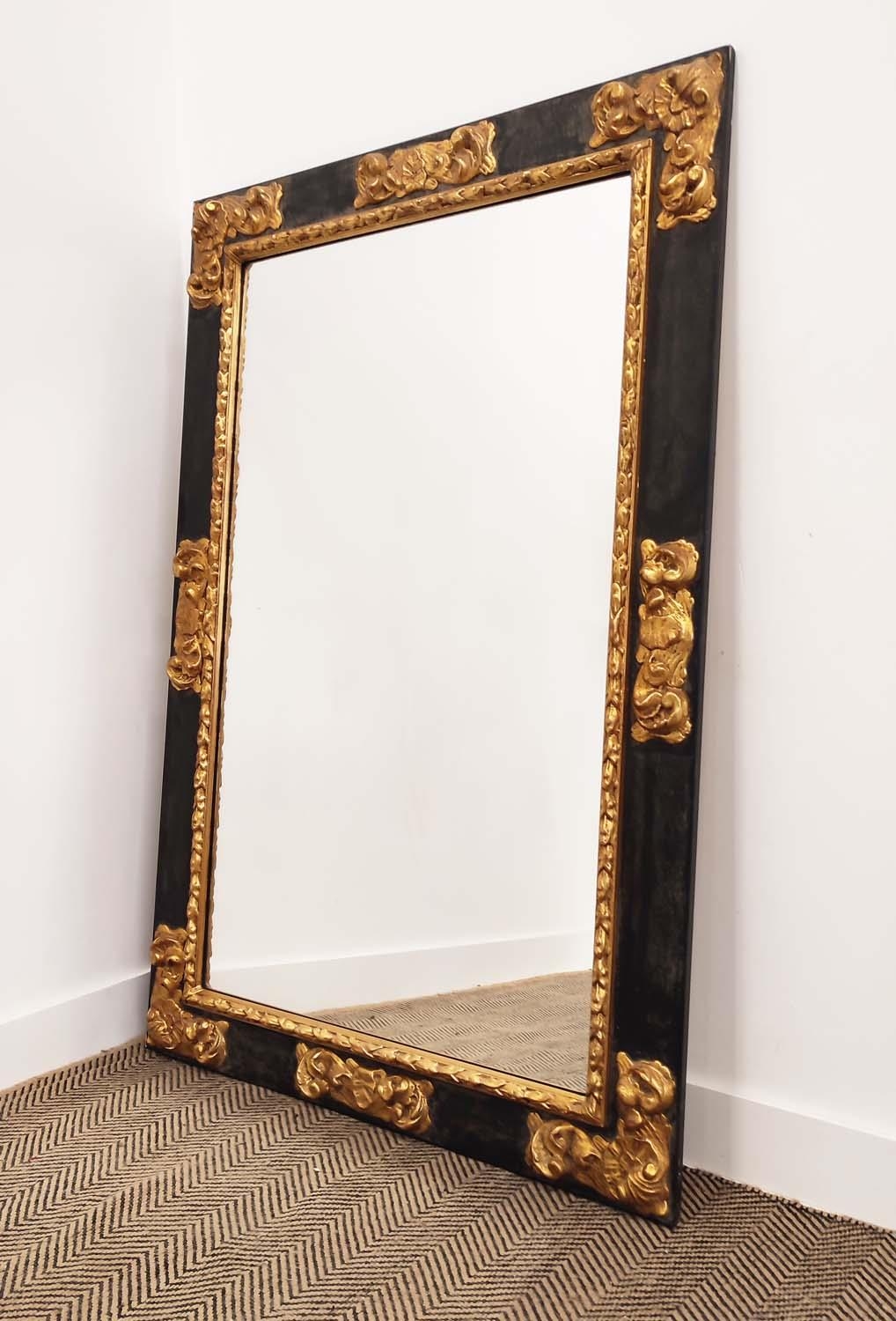 WALL MIRROR, 19th century style Continental ebonised and gilt framed with rectangular plate, 152cm x
