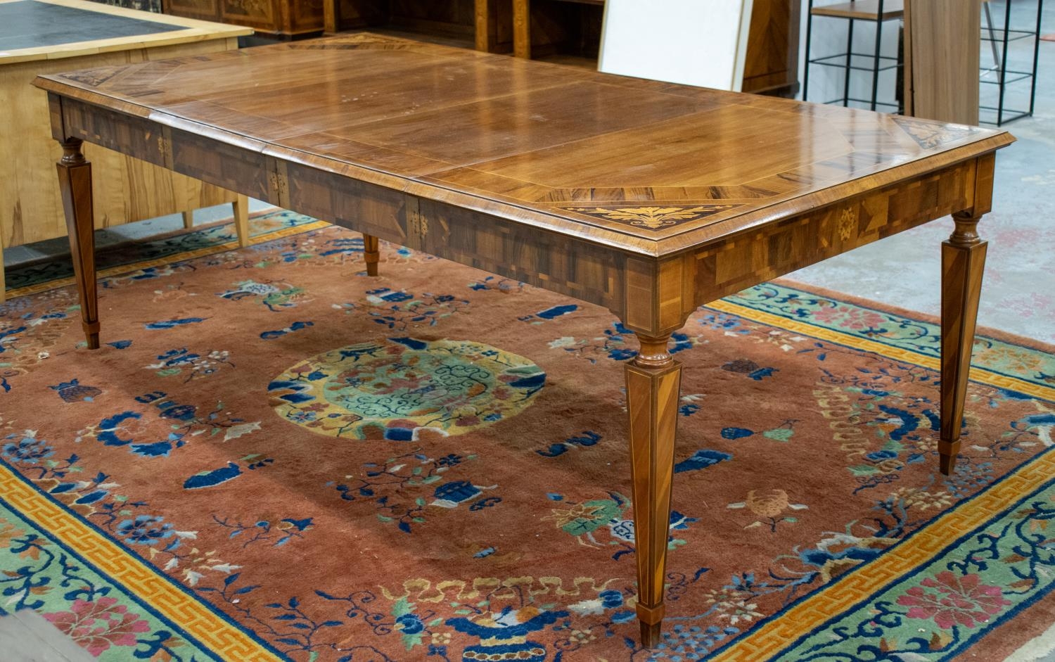 DINING TABLE, Italian walnut and marquetry with two extra leaves, 78cm H x 112cm x 127cm L, 223cm