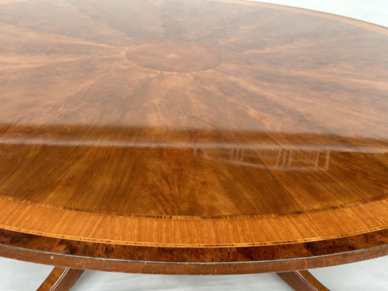 DINING TABLE, circular Regency style radially veneered mahogany and satinwood crossbanded with - Image 6 of 17
