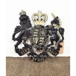 COAT OF ARMS, black and gold painted cast iron, 50cm H x 50cm.