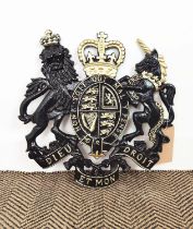 COAT OF ARMS, black and gold painted cast iron, 50cm H x 50cm.