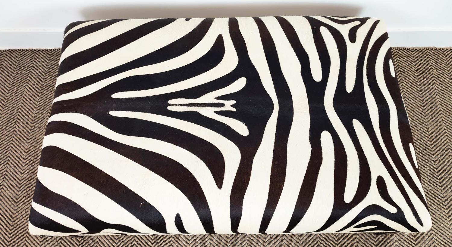 HEARTH STOOL, rectangular zebra skin on ebonised legs, 40cm H x 120cm x 76cm. - Image 9 of 14