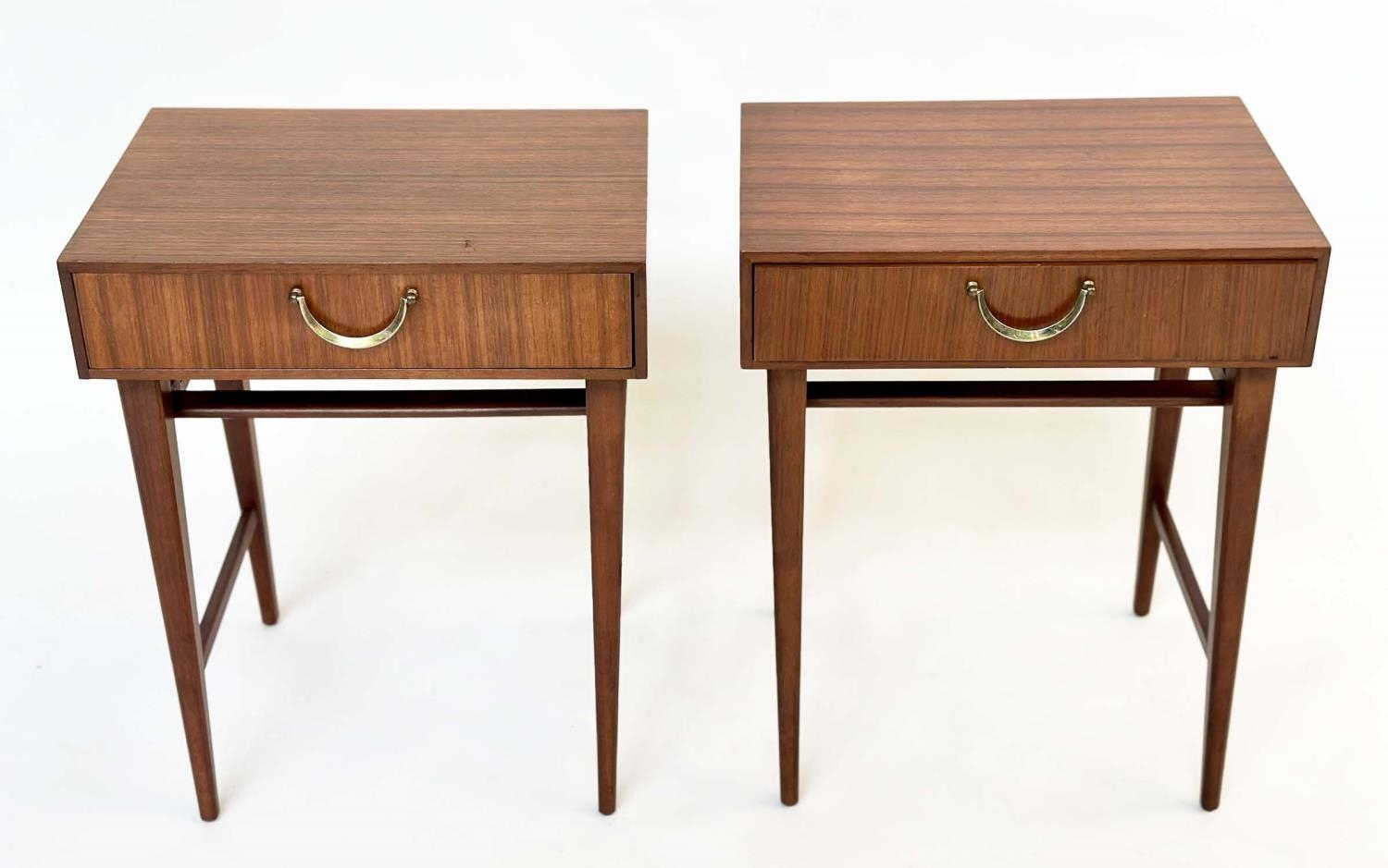 MEREDEW LAMP TABLES, a pair, 1970s Afromosia and teak, each with frieze drawer and stretchered