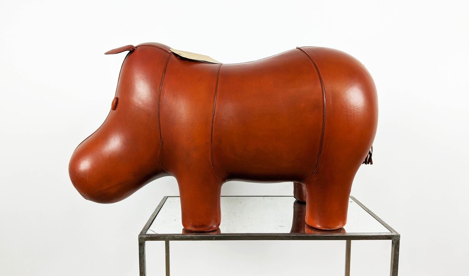 HIPPOPOTAMUS STOOL, tan leather, 77cm L x 40cm H x 33cm W.