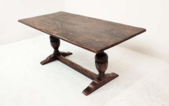 REFECTORY TABLE, Jacobean style oak, the rectangular top on carved balaster bases, 185cm W x 83cm