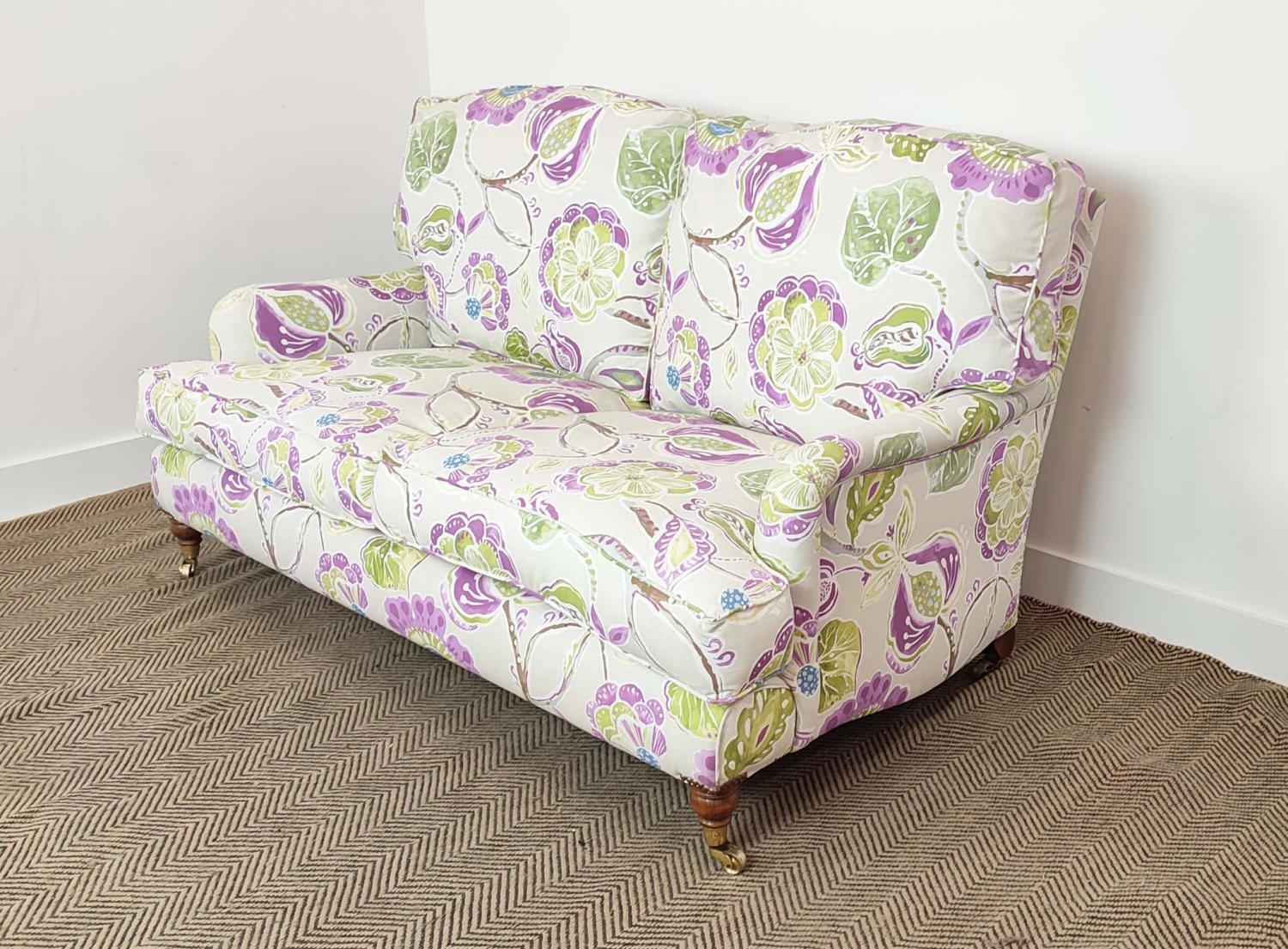 SOFA, purple and green floral patterned on brass castors, 90cm H x 160cm W. - Image 6 of 14