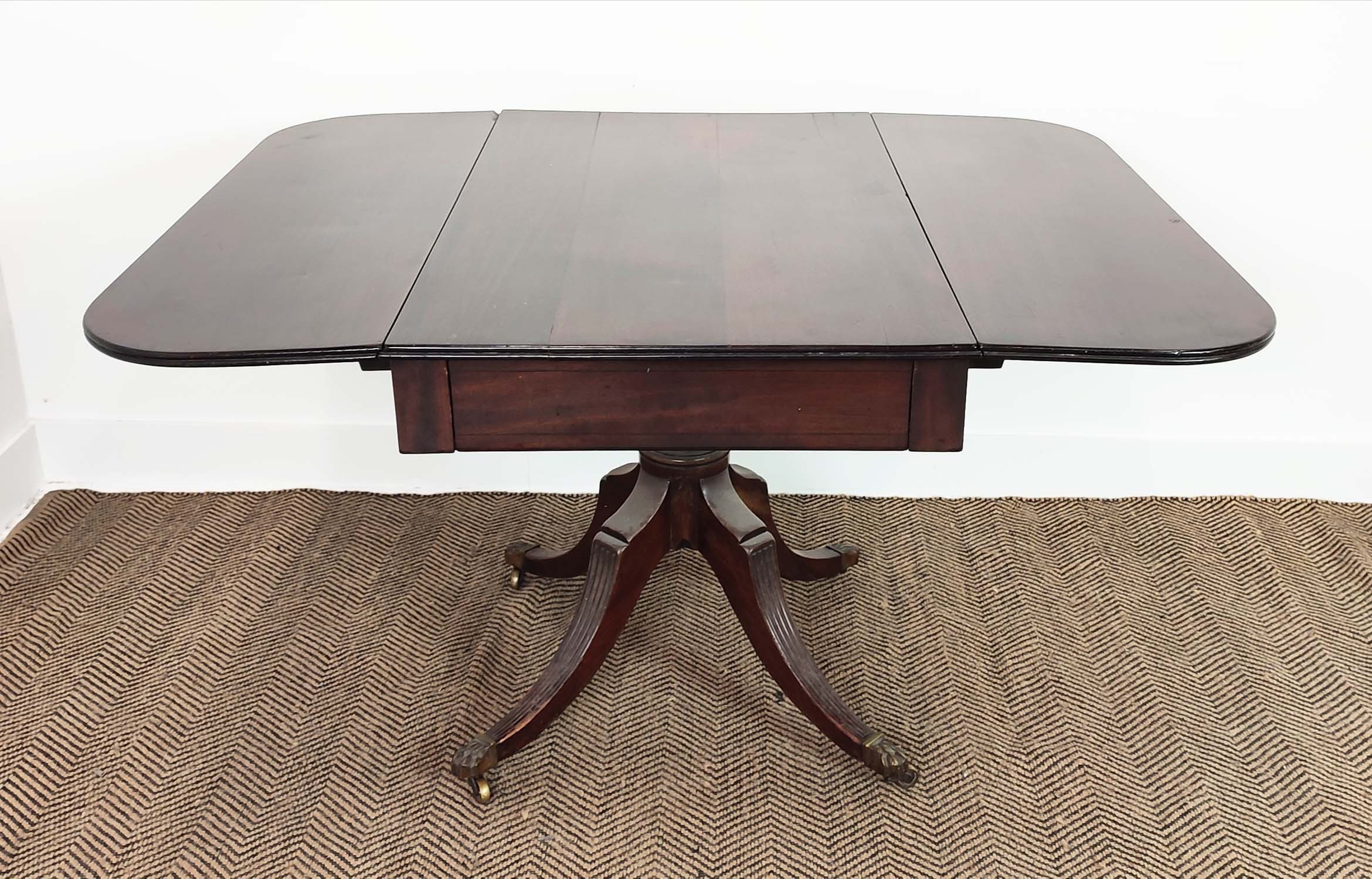 PEDESTAL PEMBROKE TABLE, Regency mahogany with a pair of drop leaves and drawer on reeded quadraform - Image 5 of 18