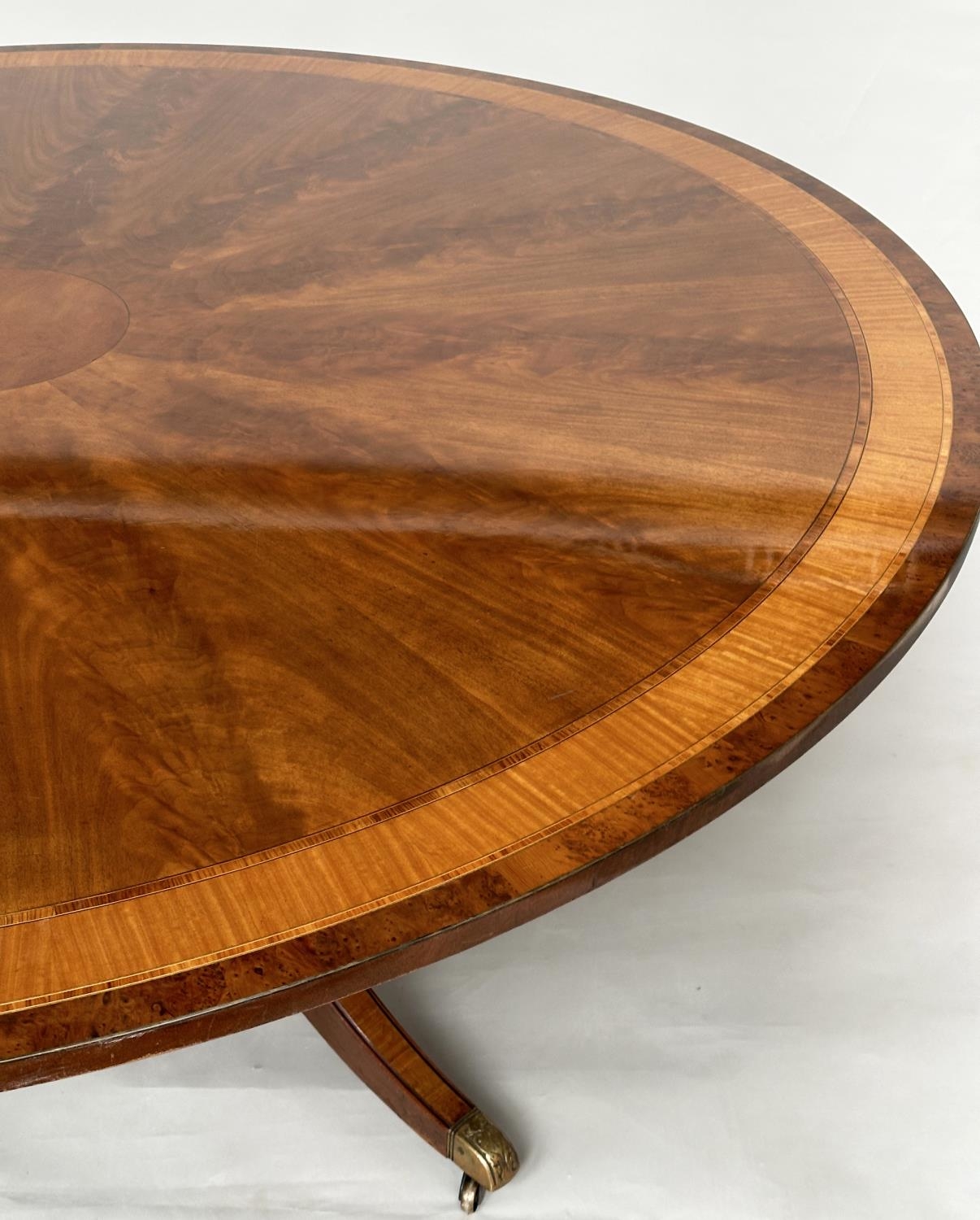 DINING TABLE, circular Regency style radially veneered mahogany and satinwood crossbanded with - Image 4 of 17