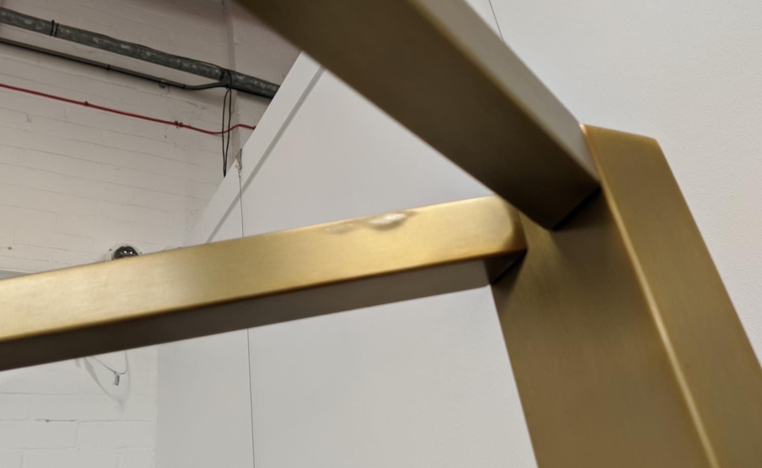 BOOKCASE, two gilt metal supports holding three veneered shelves, 200cm x 50cm x 208.5cm approx. - Bild 6 aus 6