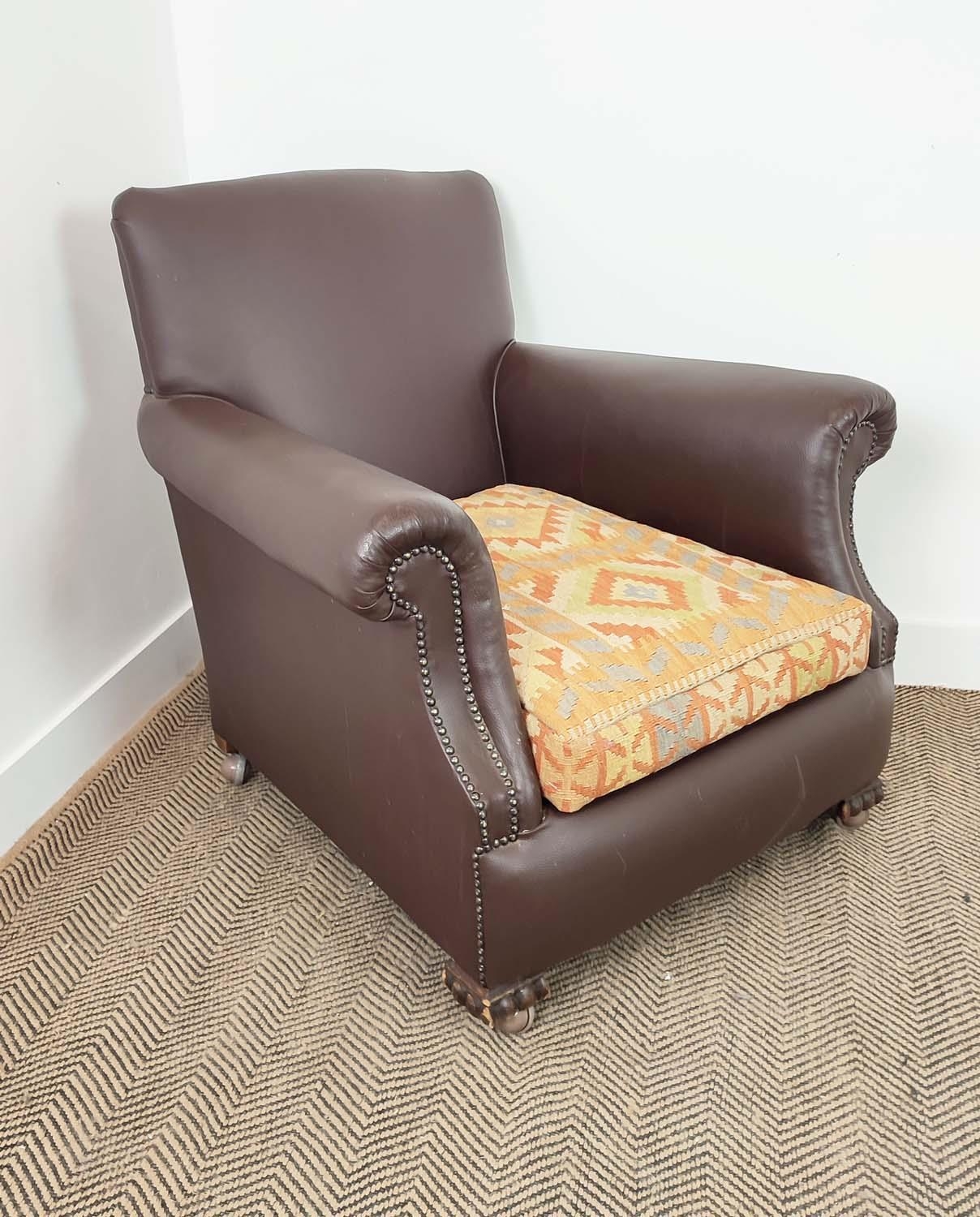 CLUB ARMCHAIR, early 20th century oak in brown leatherette with kilim seat cushion and modern