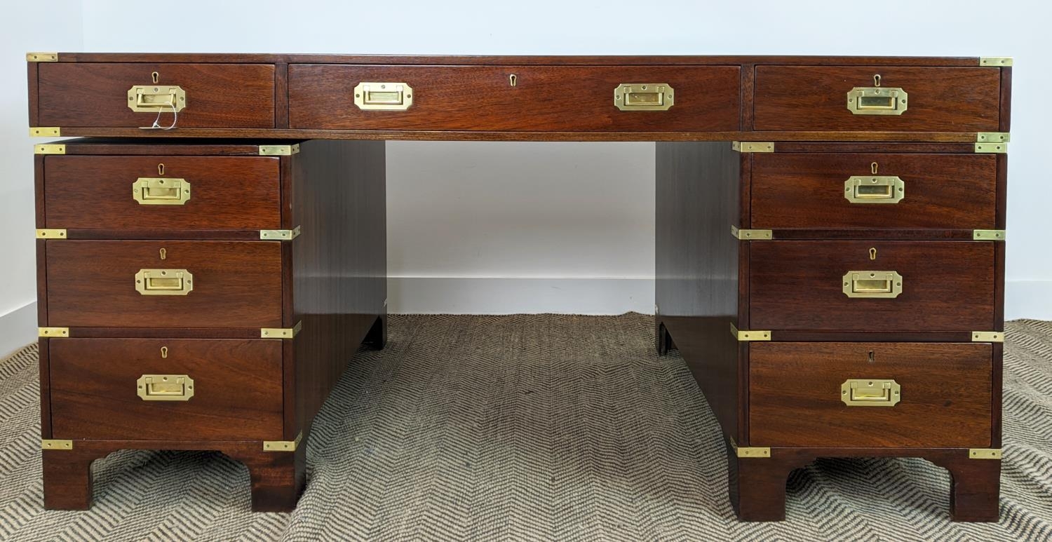 CAMPAIGN STYLE PEDESTAL DESK, mahogany and brass bound with brown leather top above nine drawers, - Image 2 of 11