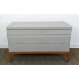 CHEST OF DRAWERS, grey lacquered main body, with three drawers, 125cm x 54cm x 76cm.