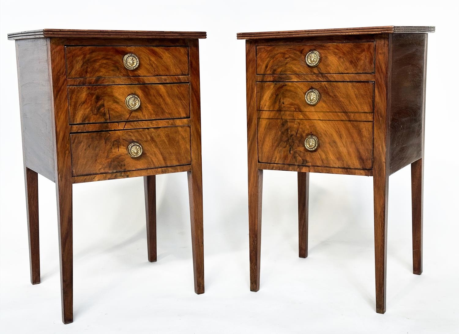 BEDSIDE CHESTS, a pair, Georgian style figured mahogany each with three drawers, 40cm W x 38cm D x