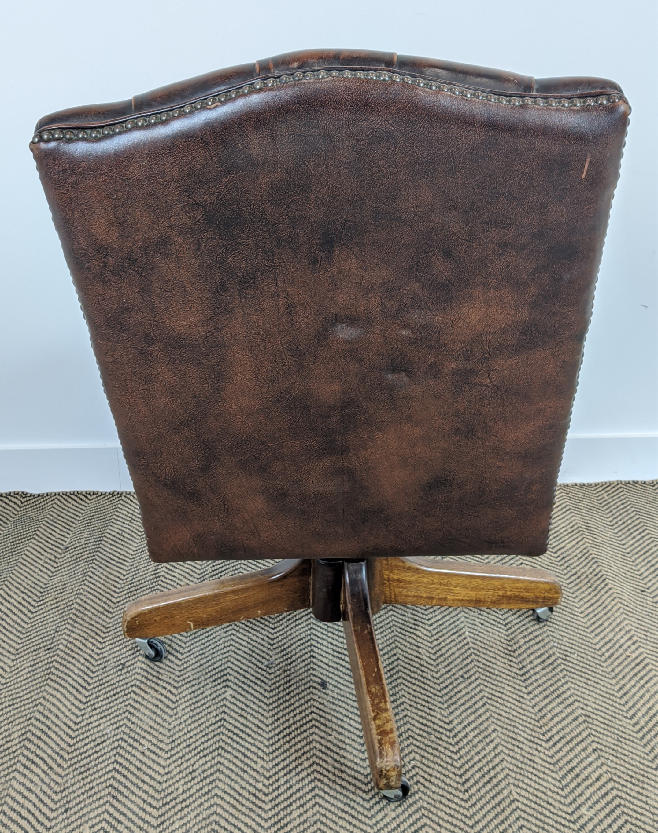 CAPTAINS DESK CHAIR, 'Hillcrest', buttoned brown leather on swivel base, mahogany frame, 96cm H x - Image 7 of 12