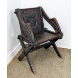 GLASTONBURY CHAIR, Victorian oak with coldstream guards ensignia carved back, 84cm H x 71cm.