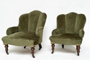 ART DECO ARMCHAIRS, a pair, early 20th century walnut with contrast piped soft green velvet