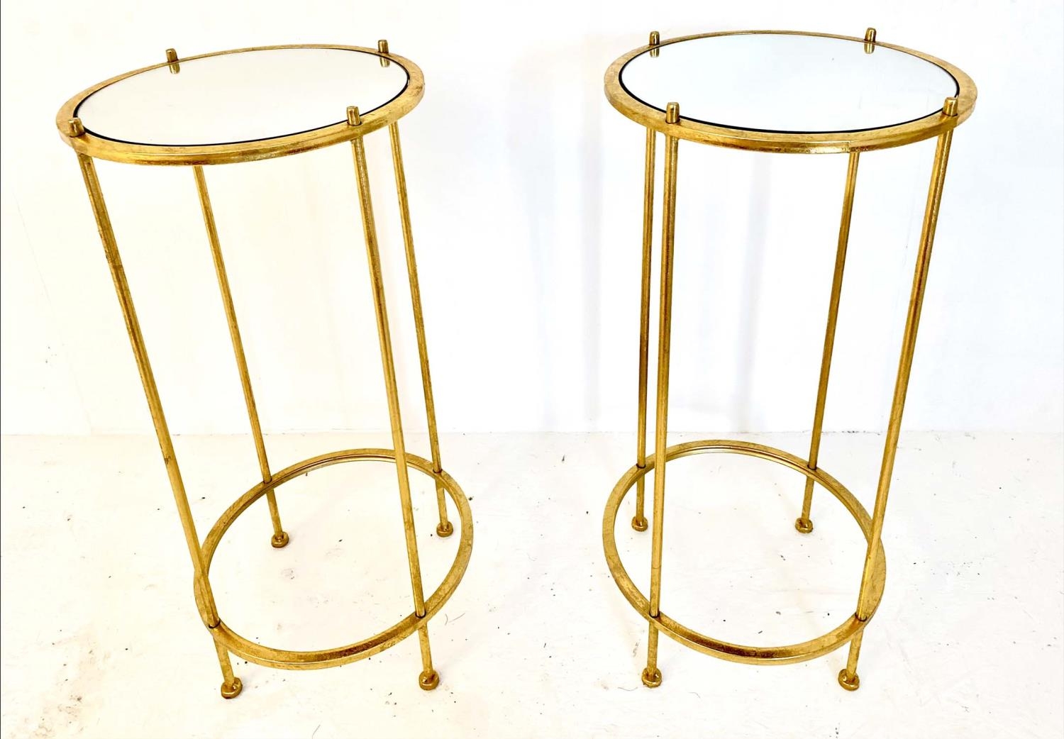 SIDE TABLES, a pair, circular, gilt metal with mirrored tops, 64cm H x 32cm W (2)