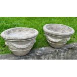 PLANTERS, a pair, well weathered reconstituted stone circular with swag decoration, 50cm x 33cm