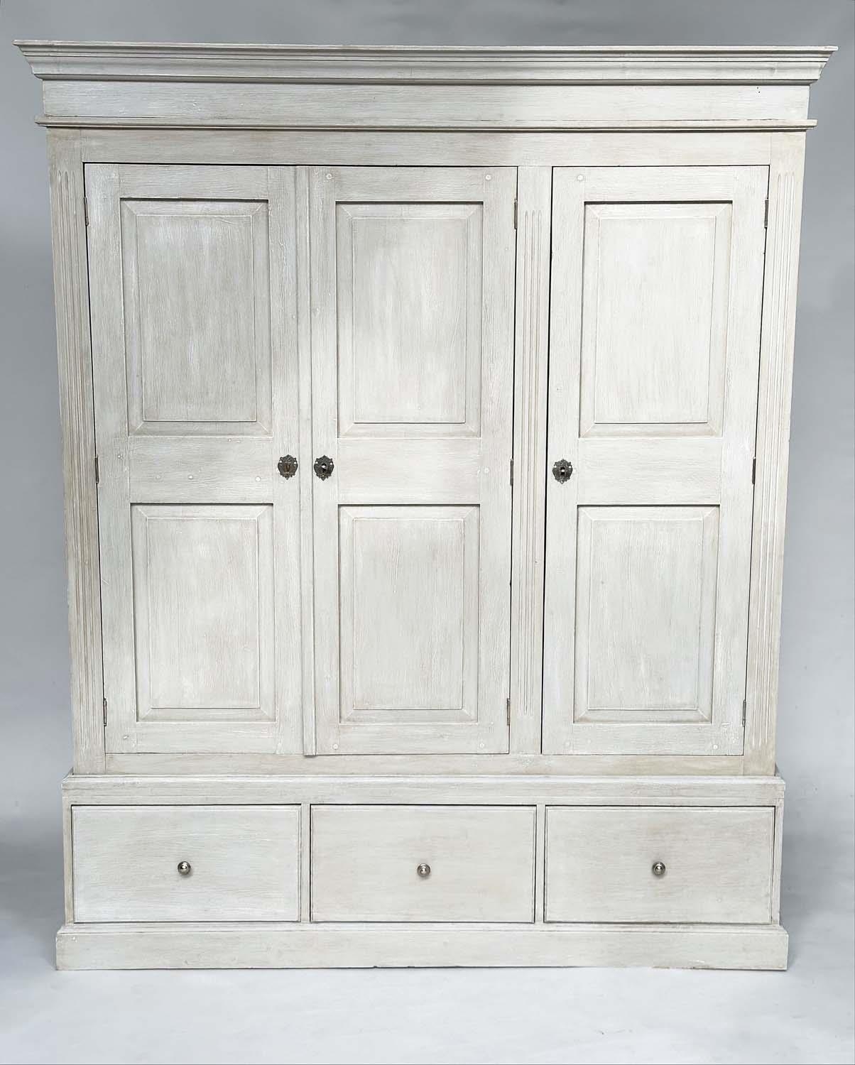 ARMOIRE, French style traditionally grey painted with three panelled doors, enclosing hanging above.