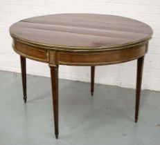 TRIPLE TOP DEMI LUNE GAMES TABLE, Directoire mahogany and brass mounted, opening into both a