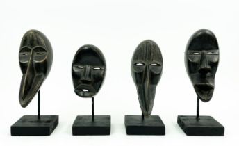 SET OF FOUR DAN MASKS (Ivory Coast), 30cm H.