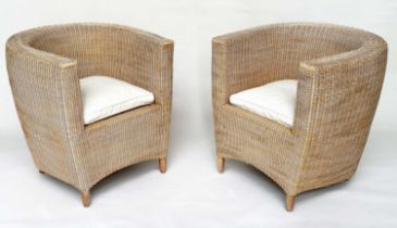 HEALS CONSERVATORY ARMCHAIRS, a pair, rattan framed and cane woven panelled with rounded backs and