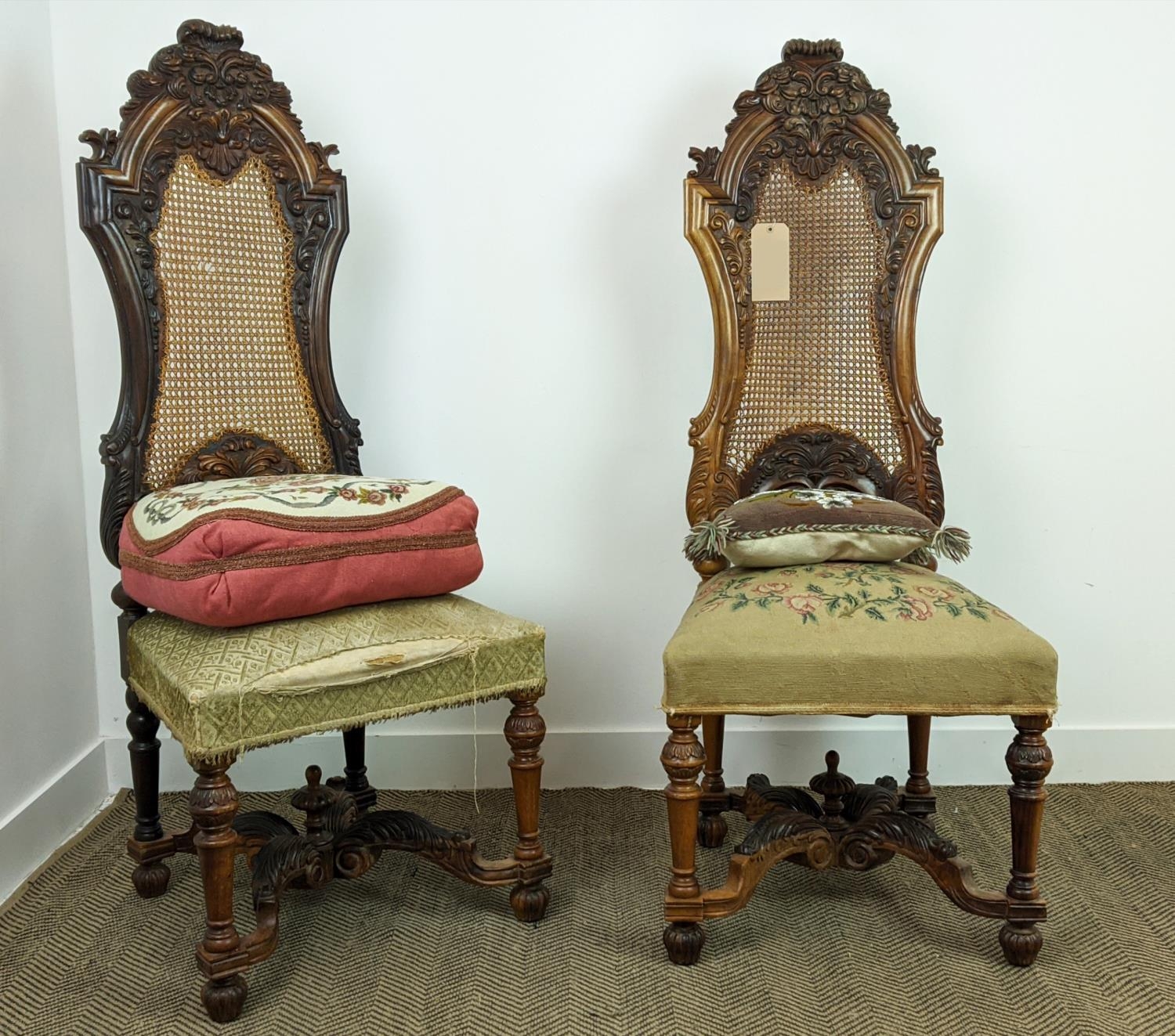SIDE CHAIRS, a pair, 19th century Dutch with carved showframes with caned back panels and