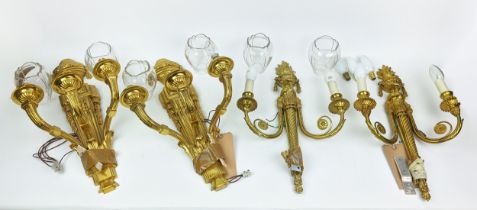 WALL LIGHTS, two pairs, Neo-classical style gilt metal, one pair with swagged urn and three