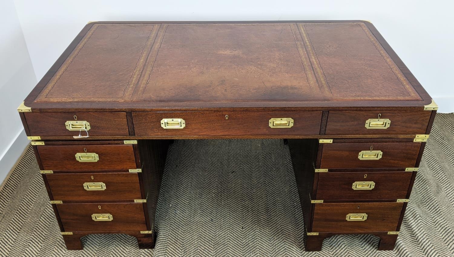 CAMPAIGN STYLE PEDESTAL DESK, mahogany and brass bound with brown leather top above nine drawers, - Image 3 of 11