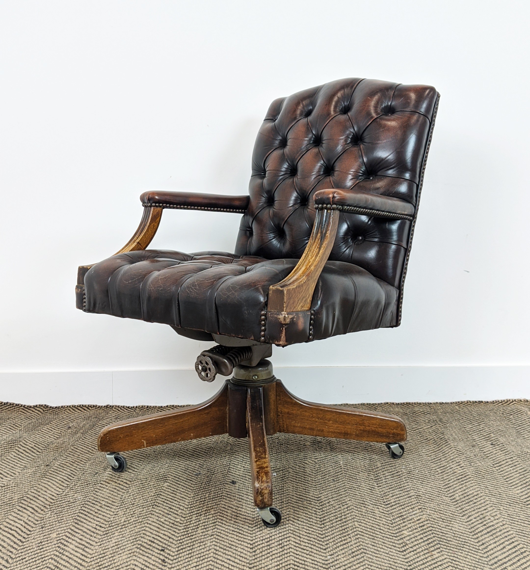 CAPTAINS DESK CHAIR, 'Hillcrest', buttoned brown leather on swivel base, mahogany frame, 96cm H x - Image 2 of 12