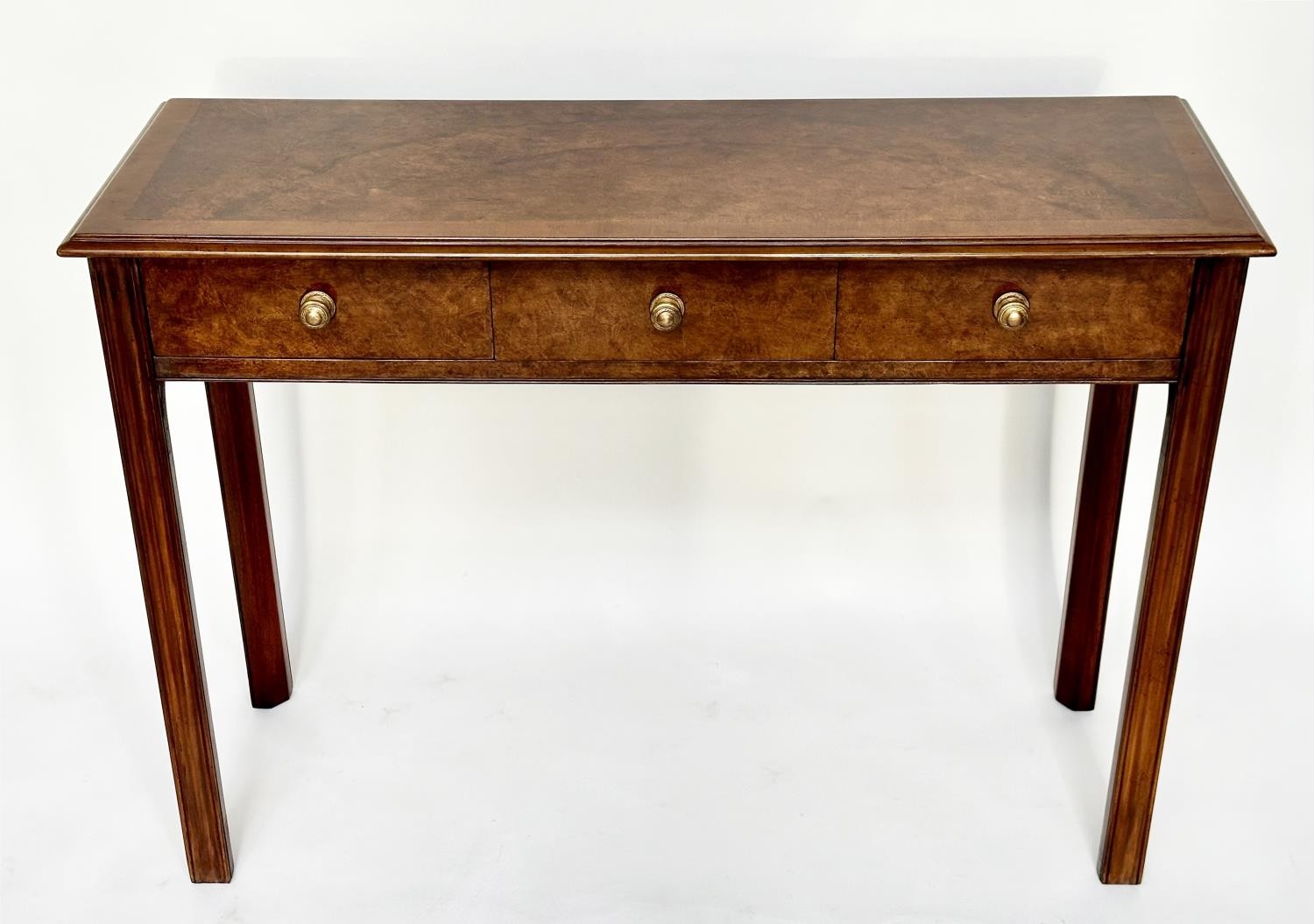 HALL TABLE, George III design walnut and crossbanded with three frieze drawers and channelled